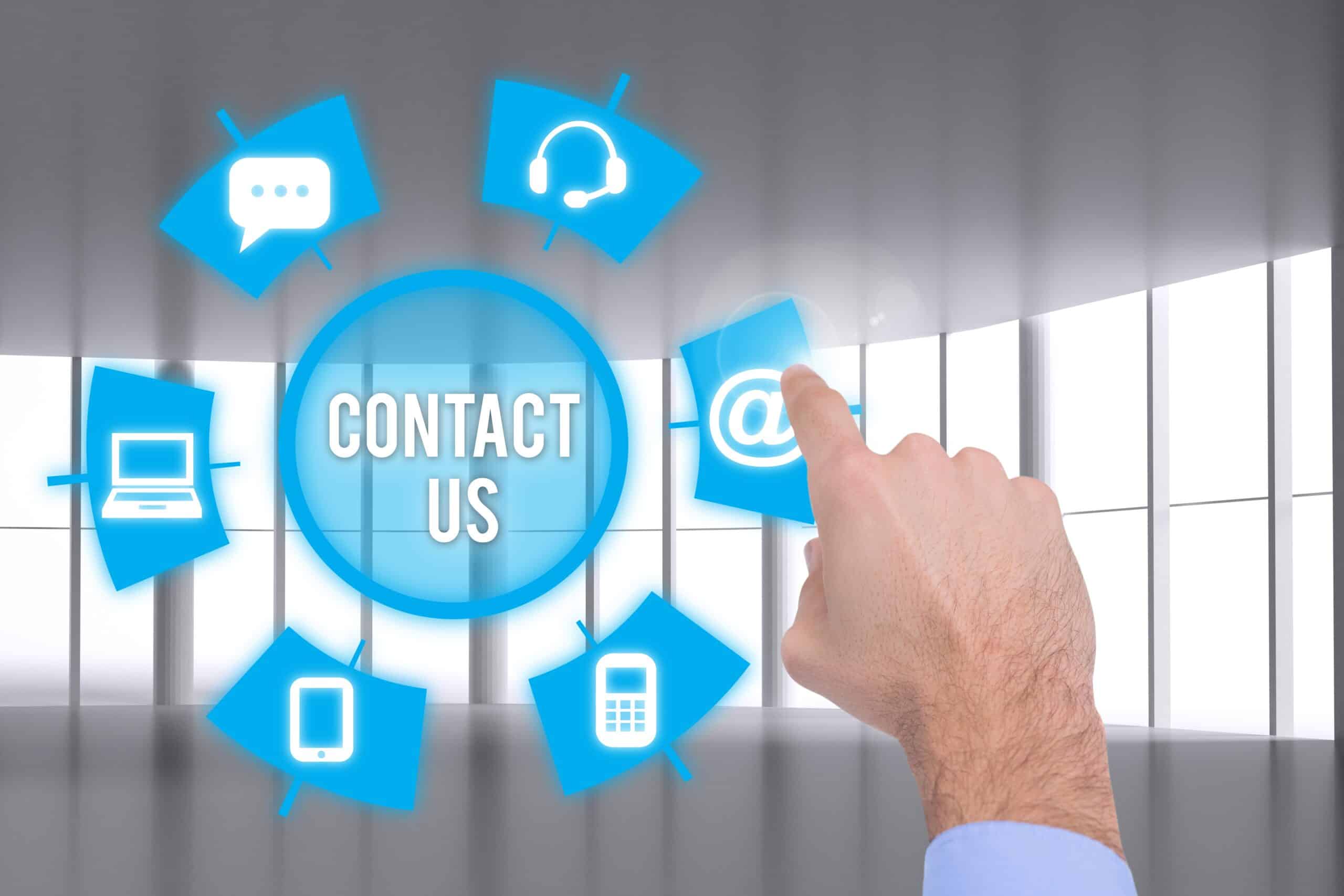 Hand selecting an email icon in a Contact Us graphic.
